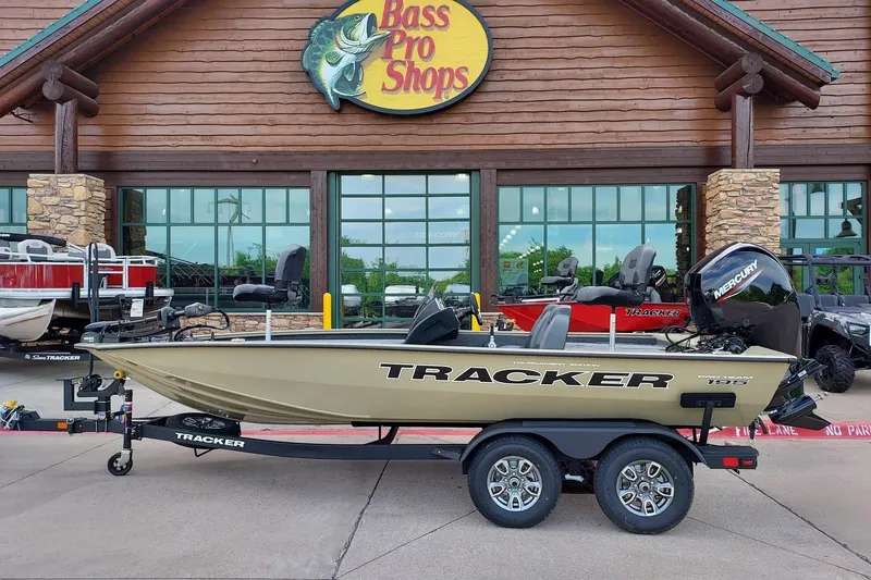The Image of 2026 Tracker Pro Team 195 boat displayed at Bass Pro Shops entrance. - 0
