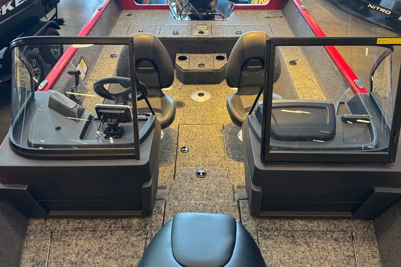 Slide: The Image of 2026 Tracker Pro Guide V-175 WT boat interior with dual consoles and seating. - 4