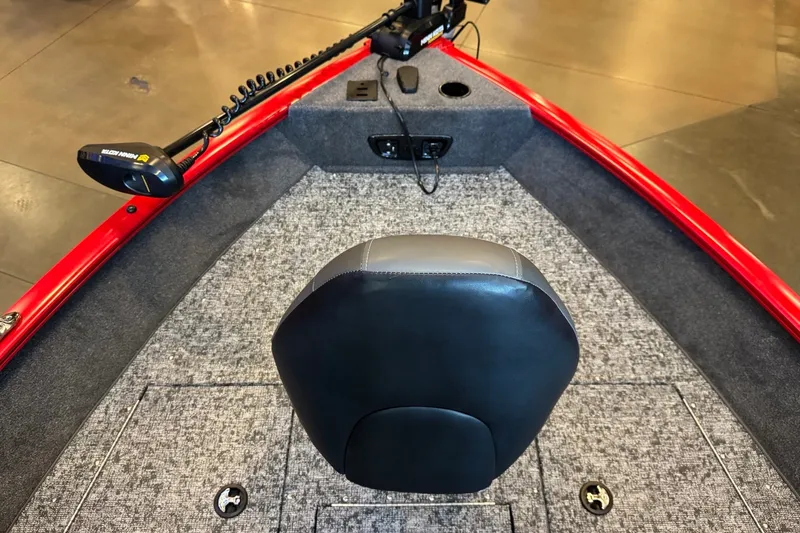 Slide: The Image of 2026 Tracker Pro Guide V-175 WT boat interior with gray seating and red trim. - 9