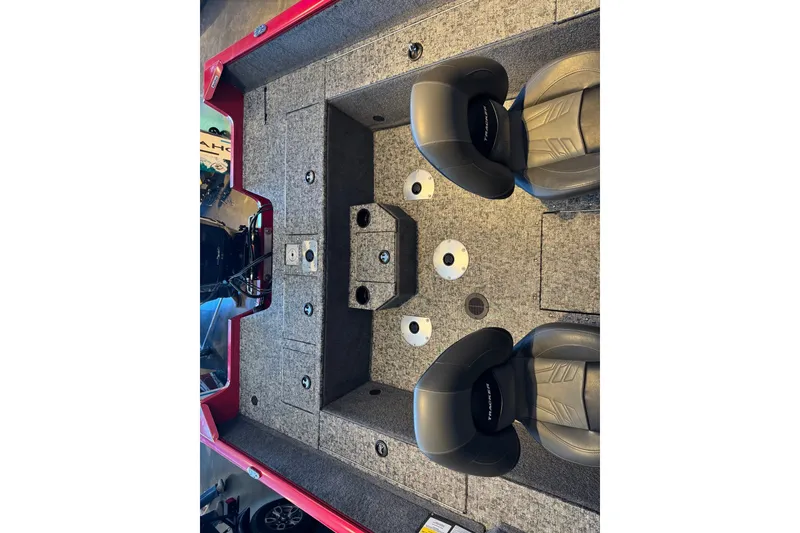 Slide: The Image of 2026 Tracker Pro Guide V-175 WT boat interior with seating and storage compartments. - 5