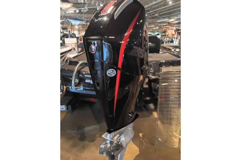 Slide: The Image of 2026 Nitro Z20 XL boat with powerful outboard motor in showroom. - 4