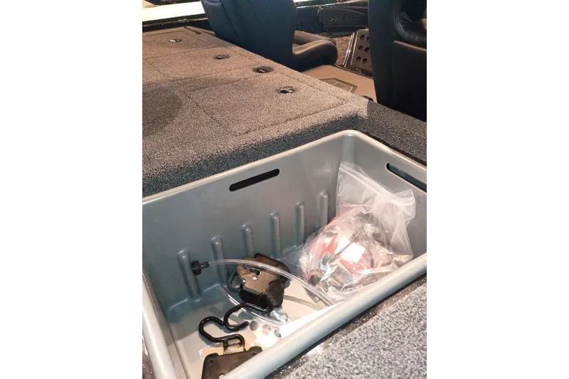 Slide: The Image of Interior storage compartment of 2026 Nitro Z20 XL boat with accessories. - 6