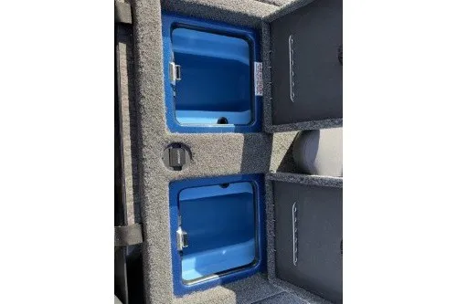 Slide: The Image of 2026 Nitro Z20 XL boat storage compartments with blue interior. - 10