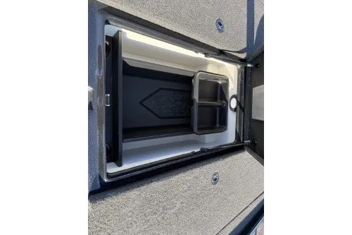 Slide: The Image of Open storage compartment in 2026 Nitro Z20 XL boat. - 11
