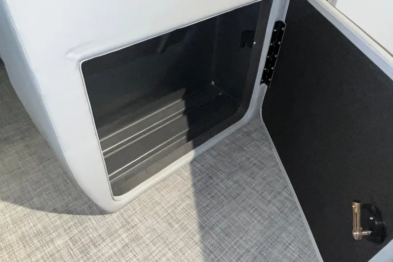Slide: The Image of Storage compartment in 2026 Sun Tracker Party Barge 20 DLX, featuring sleek interior design. - 33