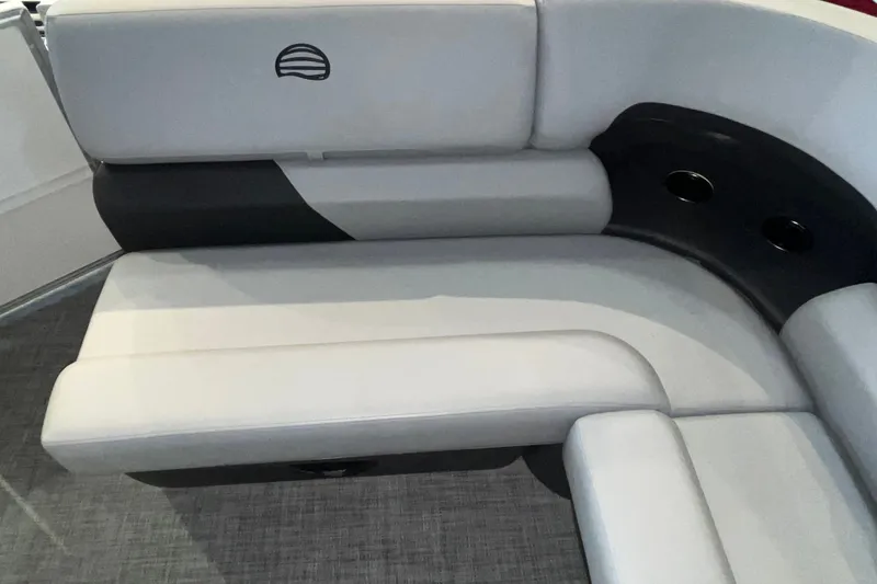 Slide: The Image of 2026 Sun Tracker Party Barge 20 DLX interior seating with cup holders. - 24