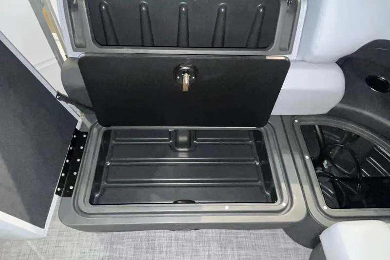 Slide: The Image of Storage compartment on a 2026 Sun Tracker Party Barge 20 DLX pontoon boat. - 21