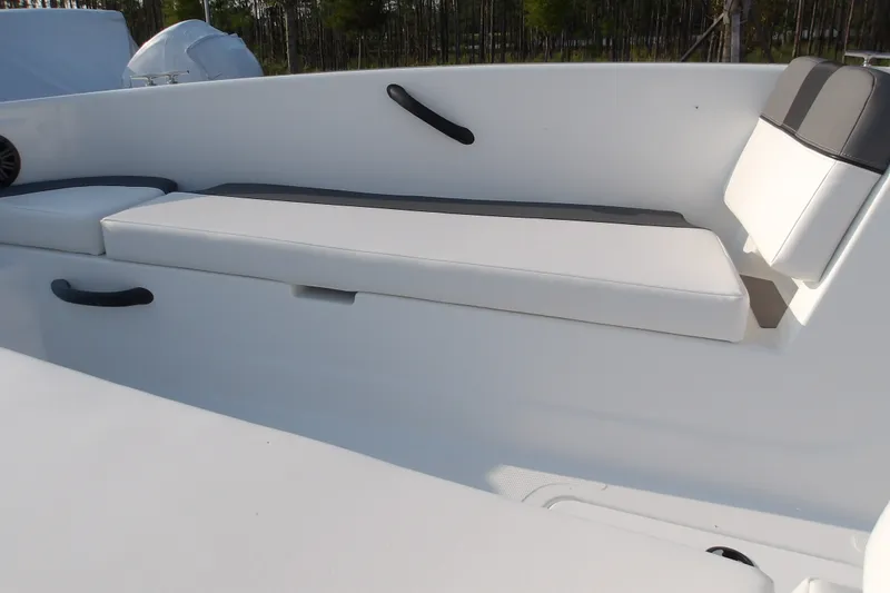 Slide: The Image of 2026 Tahoe T18 boat interior with white cushioned seating and sleek design. - 12