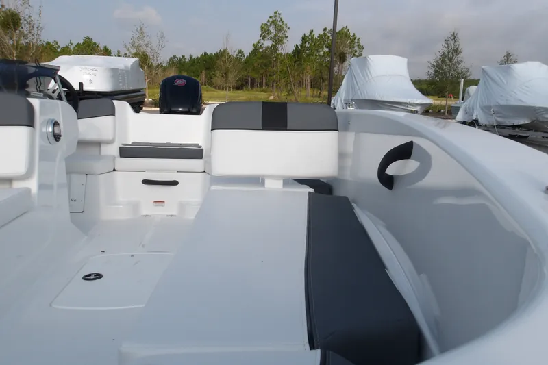 Slide: The Image of 2026 Tahoe T18 boat interior with sleek seating and modern design. - 10