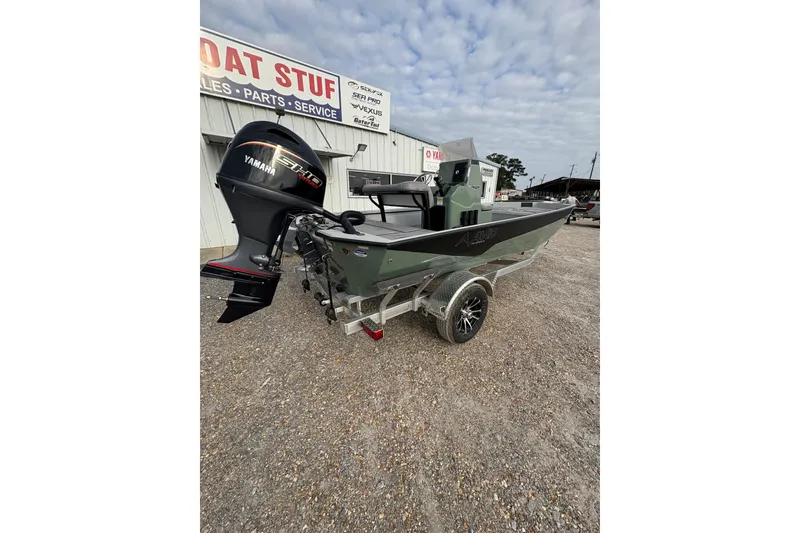 Slide: The Image of 2026 Avid 18 Rogue CC boat with Yamaha outboard motor on a trailer. - 4