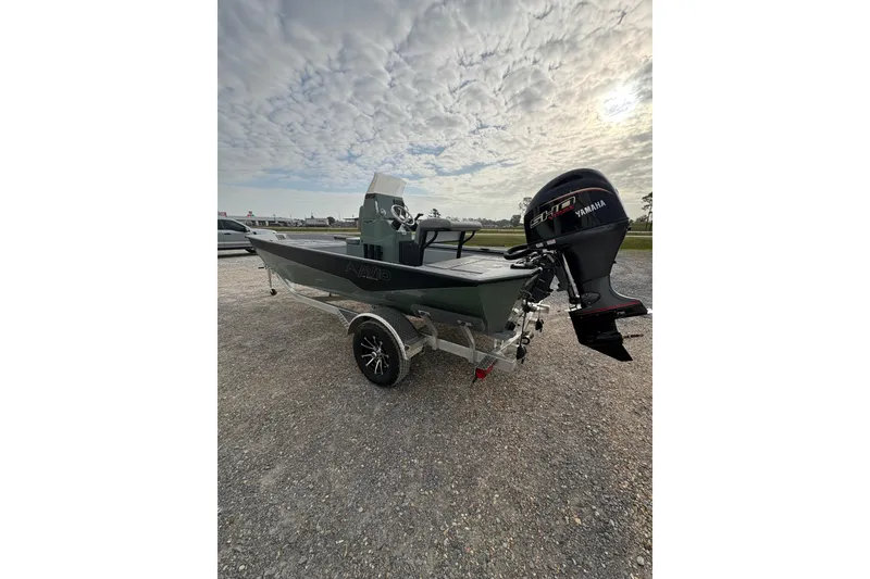 Slide: The Image of Avid 18 Rogue CC 2026 boat parked on trailer outdoors. - 5