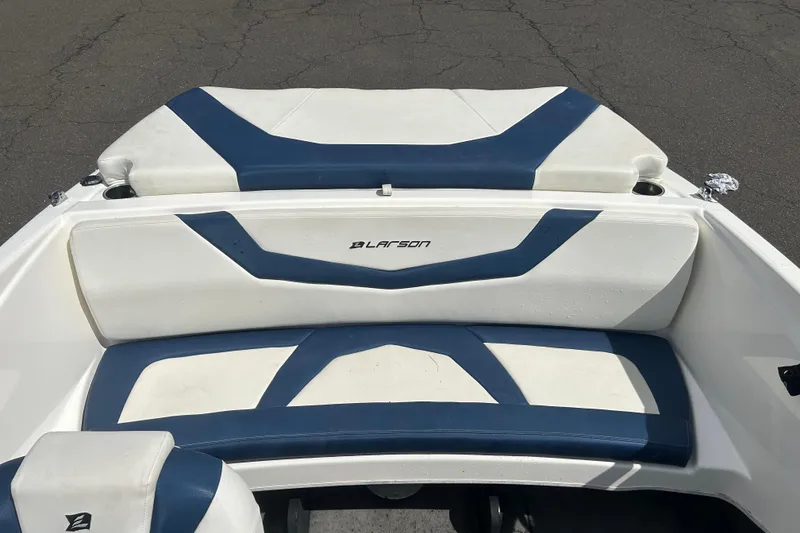 Slide: The Image of 2017 Larson LX 185S I/O boat interior with blue and white seating. - 19
