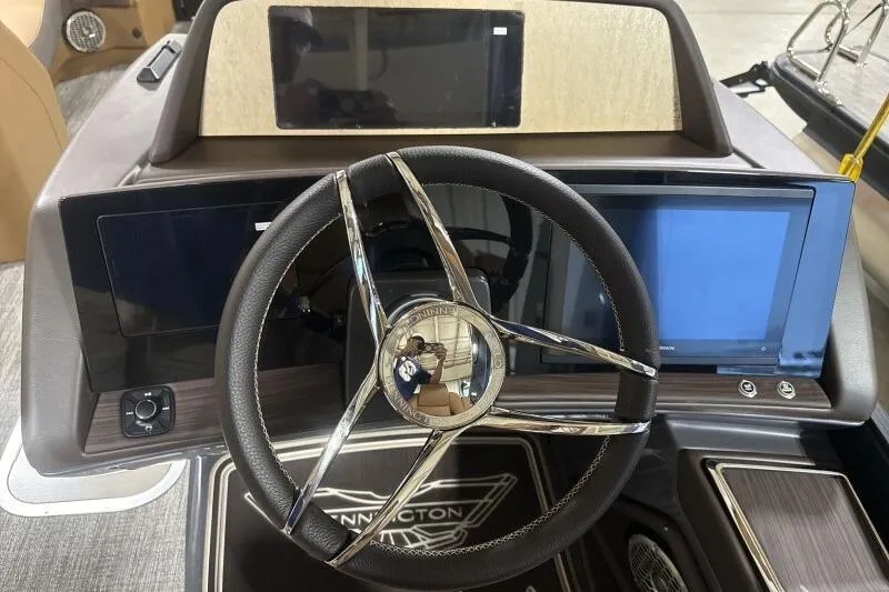 Slide: The Image of Steering wheel and dashboard of 2026 Bennington R 23 RSBA boat. - 10