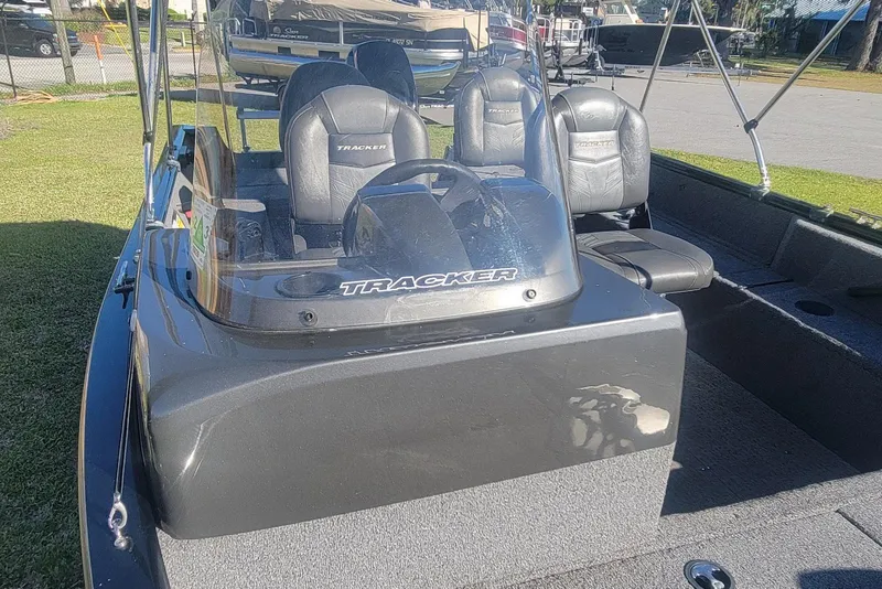 Slide: The Image of 2020 Tracker Pro Guide V-16 SC boat with seating and steering console. - 7