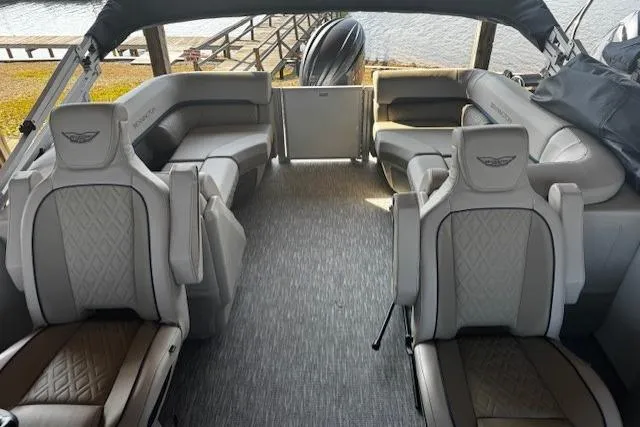 Slide: The Image of Luxurious interior of 2026 Bennington 22 MFB pontoon boat with plush seating. - 13