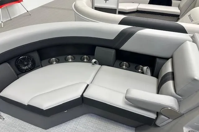 The Image of 2025 Berkshire 22RFX CTS boat interior with plush seating and integrated cup holders. - 1