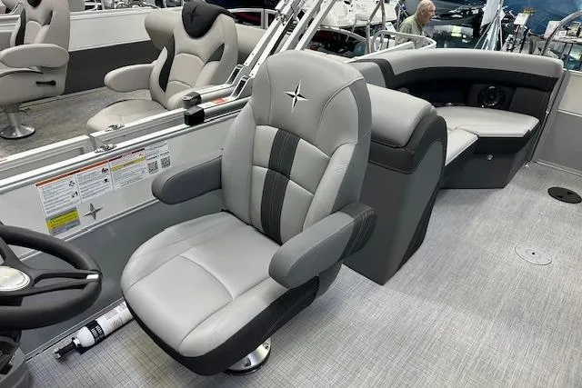 Slide: The Image of Luxurious interior of 2025 Berkshire 22RFX CTS pontoon boat with plush seating. - 11