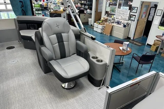 Slide: The Image of Luxurious interior of 2025 Berkshire 22RFX CTS pontoon boat with plush seating and modern design. - 12