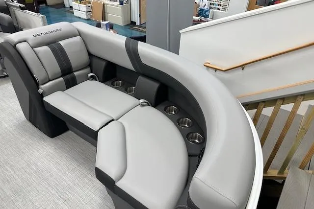 Slide: The Image of Luxurious seating on 2025 Berkshire 22RFX CTS pontoon boat with cup holders. - 13