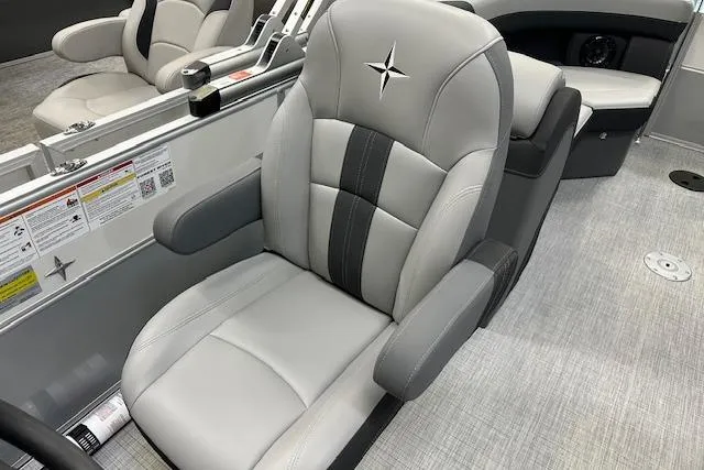 Slide: The Image of 2025 Berkshire 22RFX CTS boat interior with luxurious gray seating and sleek design. - 5