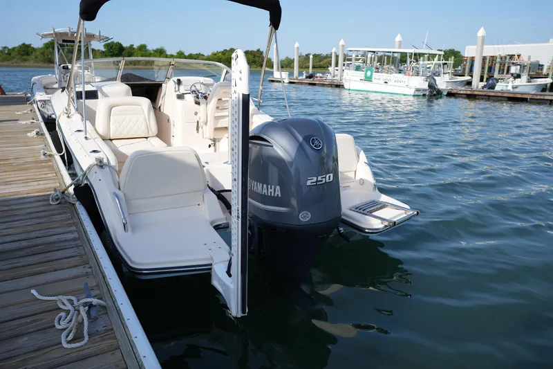 Slide: The Image of 2021 Grady-White Freedom 215 boat docked with Yamaha 250 engine. - 14