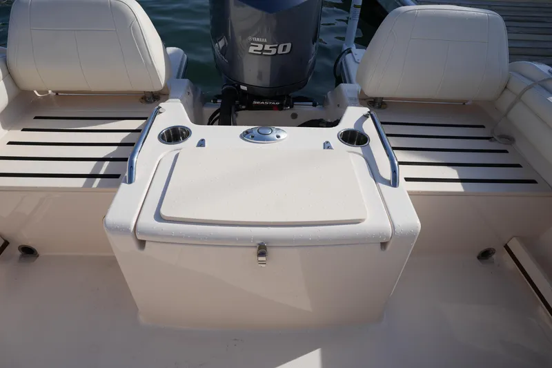 Slide: The Image of 2021 Grady-White Freedom 215 boat interior with Yamaha 250 engine. - 17