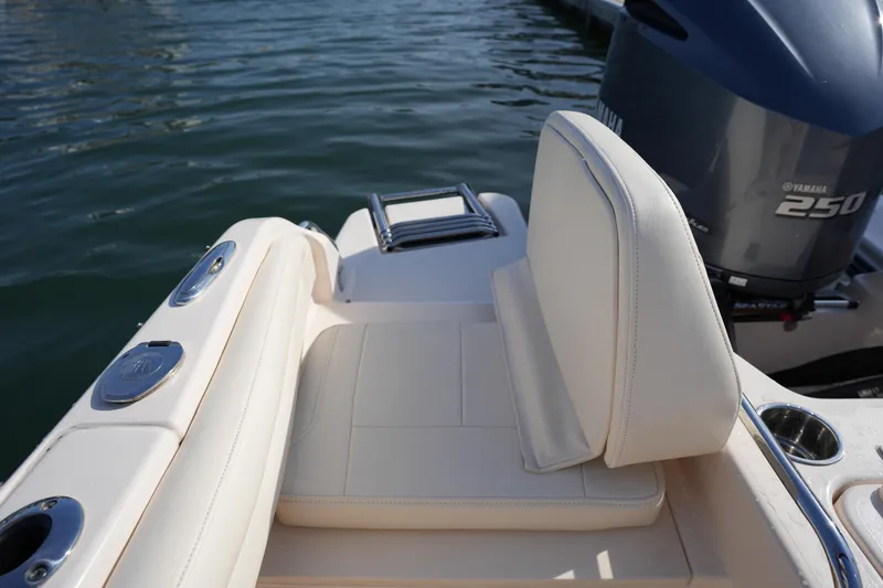 Slide: The Image of 2021 Grady-White Freedom 215 boat with Yamaha 250 engine, featuring comfortable seating. - 19