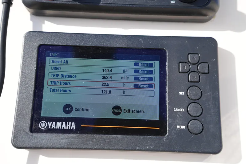 Slide: The Image of Yamaha display showing trip data: 140.4 gallons used, 362.6 miles traveled, 22.5 trip hours. - 26