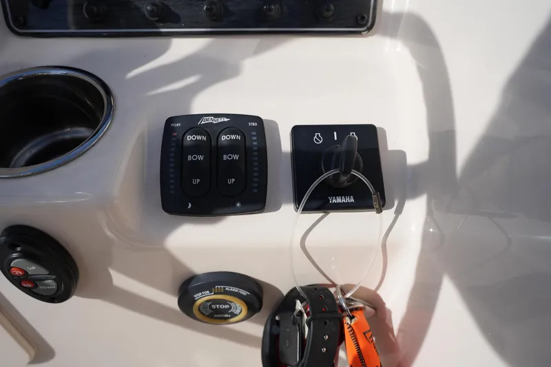 Slide: The Image of Control panel of a 2021 Grady-White Freedom 215 boat with Yamaha ignition. - 29