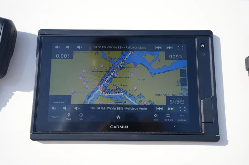 Slide: The Image of Garmin GPS display on 2021 Grady-White Freedom 215 boat, showing navigation map. - 33