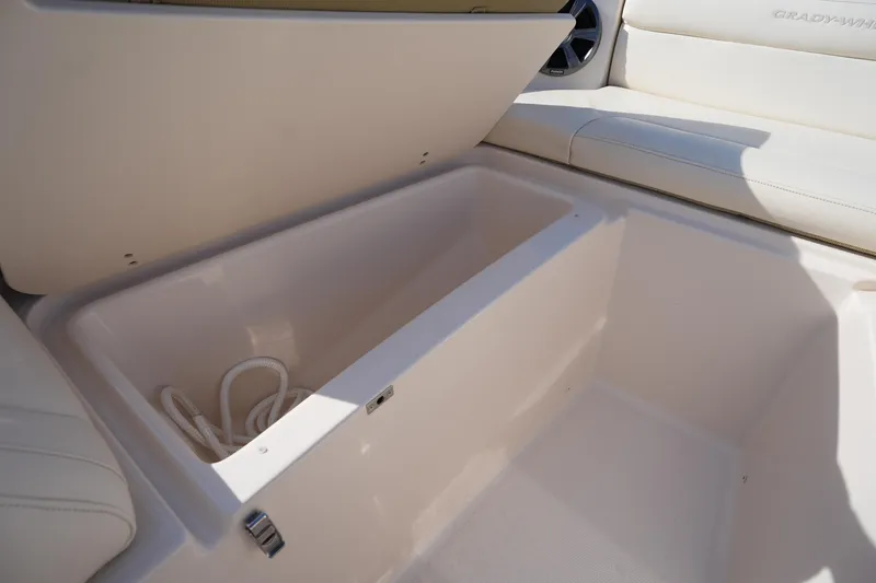 Slide: The Image of Storage compartment in 2021 Grady-White Freedom 215 boat, featuring spacious interior. - 38