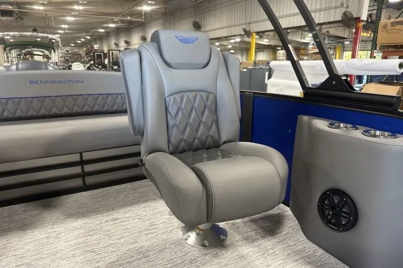 Slide: The Image of Luxurious seating on 2026 Bennington 23 LXS Swingback pontoon boat, featuring elegant design and comfort. - 11