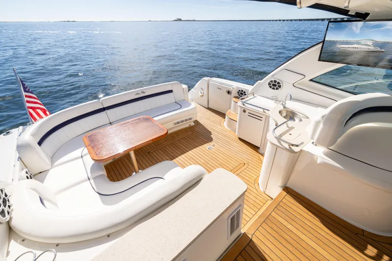 Slide: The Image of Luxurious 2010 Sea Ray 500 Sundancer yacht deck with seating and ocean view. - 18