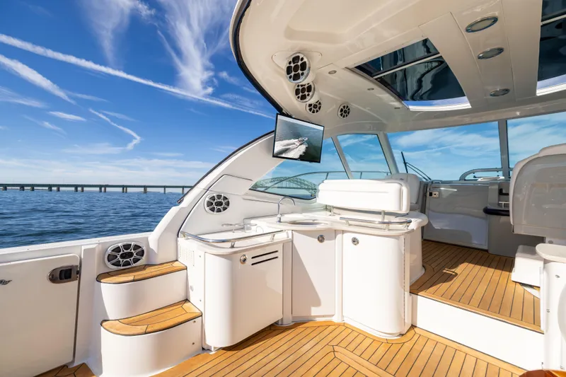 Slide: The Image of Luxurious 2010 Sea Ray 500 Sundancer yacht interior with sleek design and scenic ocean view. - 22