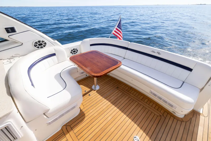 Slide: The Image of Luxurious 2010 Sea Ray 500 Sundancer yacht deck with seating and ocean view. - 27