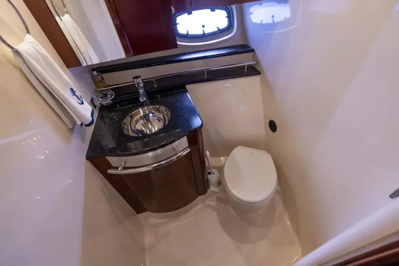 Slide: The Image of Luxurious bathroom in 2010 Sea Ray 500 Sundancer yacht with sink and toilet. - 42