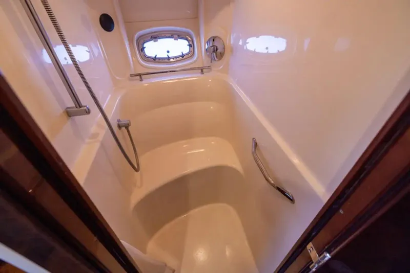 Slide: The Image of Luxurious shower area in 2010 Sea Ray 500 Sundancer yacht. - 45