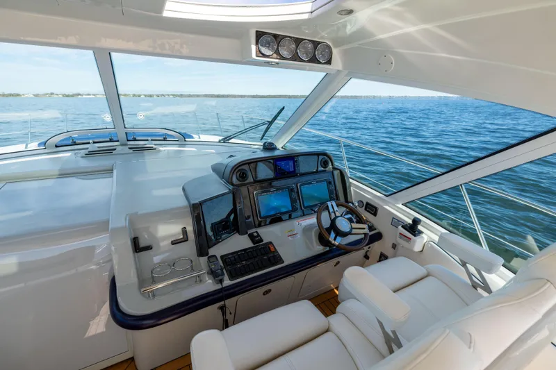 Slide: The Image of Luxurious helm of 2010 Sea Ray 500 Sundancer yacht with advanced navigation systems. - 6