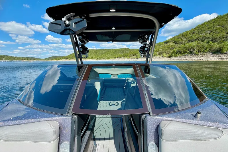 Slide: The Image of 2016 Malibu Wakesetter 25 LSV on a scenic lake with clear skies. - 31