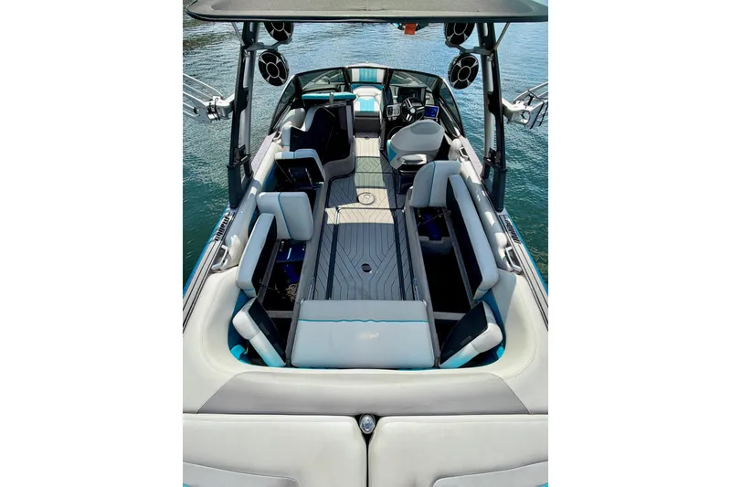 Slide: The Image of 2016 Malibu Wakesetter 25 LSV interior with spacious seating and modern design on water. - 40