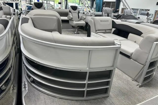 Slide: The Image of Luxurious interior of 2026 Berkshire 24UL LE B pontoon boat with plush seating. - 10
