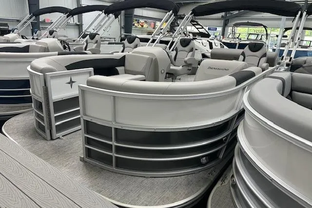 Slide: The Image of 2026 Berkshire 24UL LE B pontoon boat with sleek design and comfortable seating. - 12