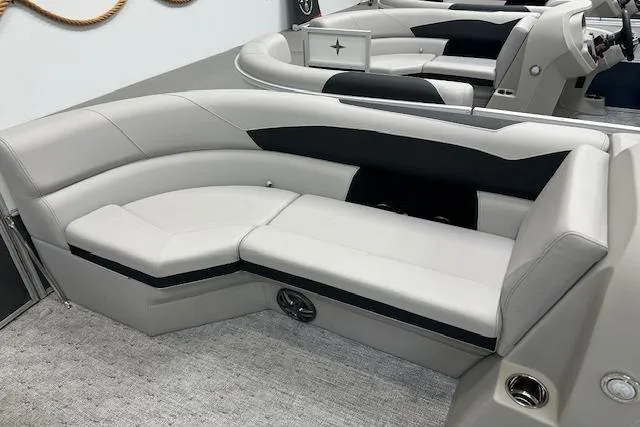 Slide: The Image of Luxurious seating in the 2026 Berkshire 24UL LE B pontoon boat interior. - 13
