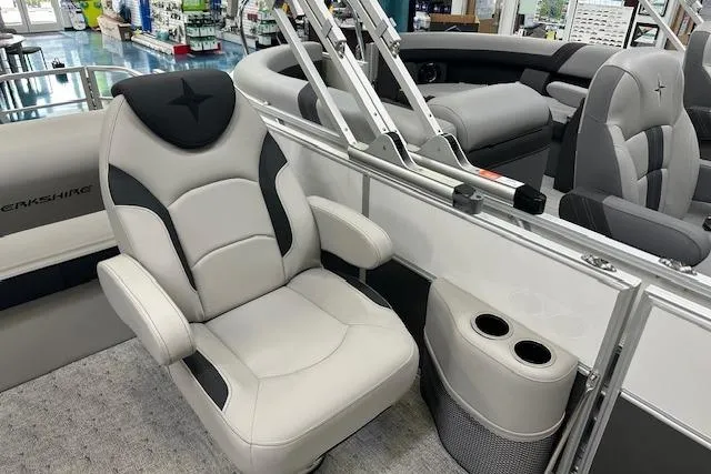 Slide: The Image of Luxurious seating on 2026 Berkshire 24UL LE B pontoon boat with cup holders. - 7
