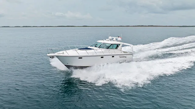 Slide: The Image of Propeller and shaft of a 2004 Tiara 3800 boat on gravel. - 17