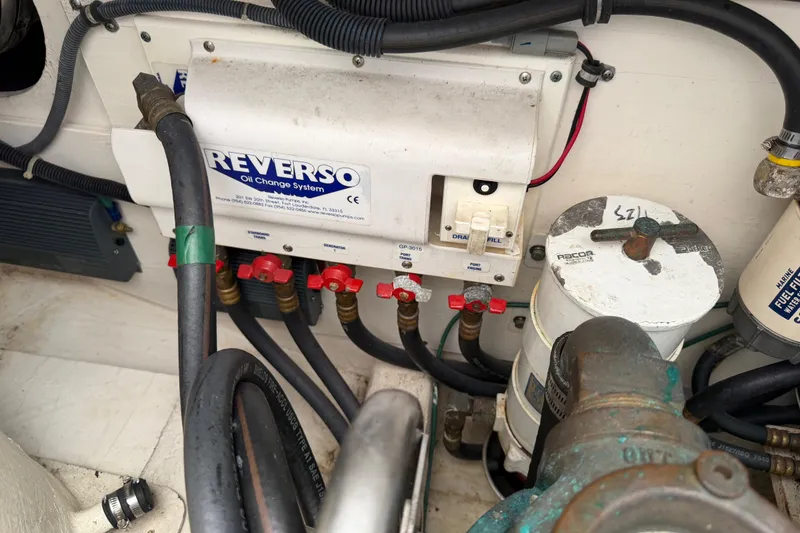 Slide: The Image of Engine compartment of a 2004 Tiara 3800 with Reverso oil change system and filters. - 31