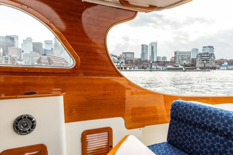 Slide: The Image of Interior view of 2002 Hinckley Picnic Boat 36 EP with city skyline through window. - 18