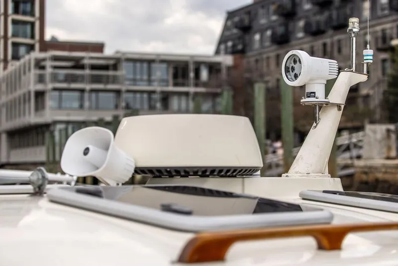 Slide: The Image of Close-up of 2002 Hinckley Picnic Boat 36 EP with radar and camera equipment. - 40