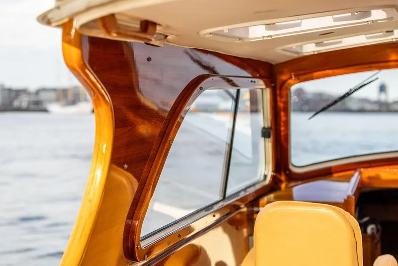 Slide: The Image of Interior view of 2002 Hinckley Picnic Boat 36 EP with polished wood finish. - 9