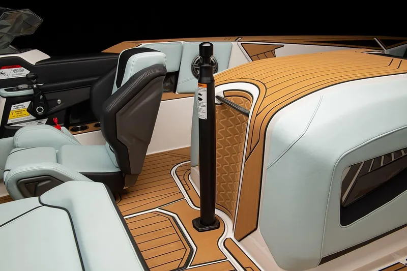 Slide: The Image of Manufacturer Provided Image: 2024 Nautique Ski boat interior with premium seating and teak flooring. - 14
